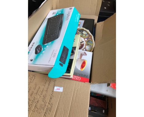 A box containing digi picture frame, keyboard, infra red lamp, etc 