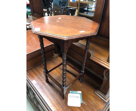 A bobbin leg occasional table. 