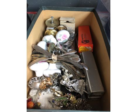 A box of misc items including watches, brooches, ceramic door handles, etc 