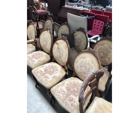 A set of eight reproduction continental style tapestry upholstered chairs. 