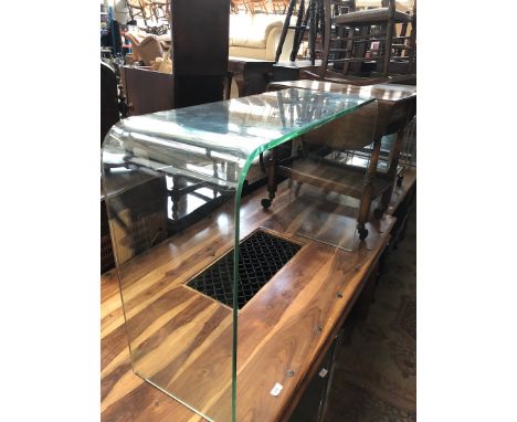 A modern bent glass console table. 