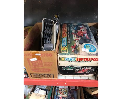 2 boxes containing Scalextric superspeed model car and track 