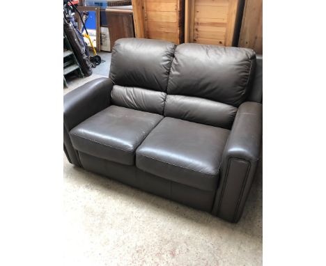 A brown leather two seater sofa. 