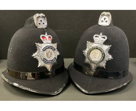 A Derbyshire Constabulary Police helmet, size 57, dated 2005, another 2002 (2)