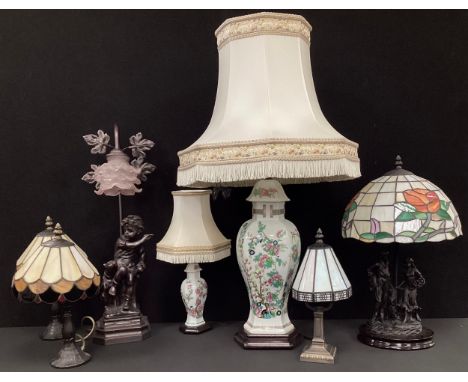 Lighting - a pair of Tiffany style table lamps;  another figural bronze effect table lamp with glass shade;  oriental style t