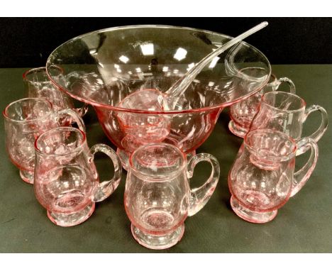 Shilbottle studio glass punch bowl service including; blown glass two tone pink swirl bowl, 26cm diameter and ladle , conform