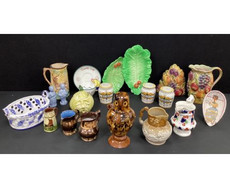 A modern slip ware owl jug and cover, impressed marks to base ‘Somerset’, 21.5cm high;  stoneware and lustre ware jugs;  Sylv