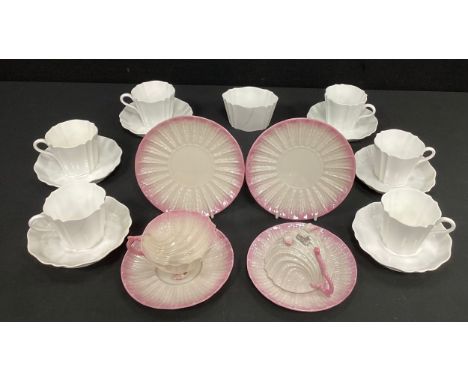 Belleek tea cups and saucers; Wedgwood octagonal scalloped moulded part tea set.