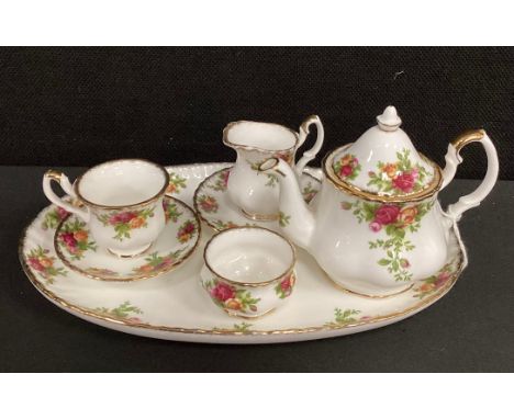 Royal Albert Old Country Roses miniature tea service on tray including tea pot, sugar bowl, milk jug, tea cup and saucer, 23c