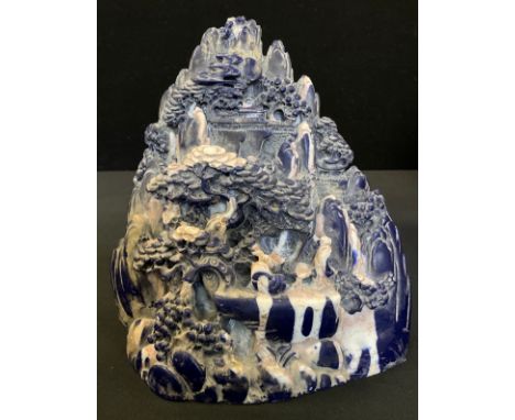 Chinese blue faux lapis lazuli stone carving of village scene, 18cm high