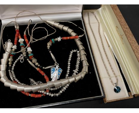 A white metal conical interconnected tubular bead necklace, another smaller beads;  Mexican/ Navajo white metal and coral bea