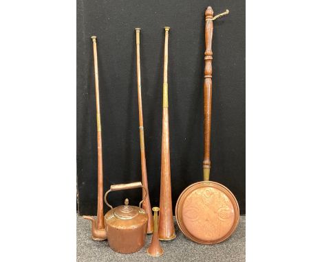 A copper and brass coaching horn, 91cm long, others smaller,   hunting horn, copper kettle etc,