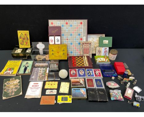 Toys and Games - 1920s Abbey mah-jong, wooden tires and instructions, assorted playing cards, advertising tins, games tokens,