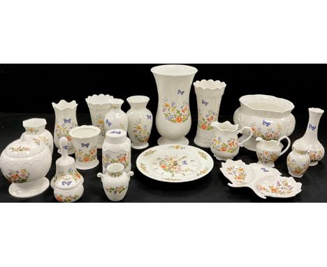 A collection of Aynsley Cottage Garden including; vases, lidded jars, clock, trinket trays; etc