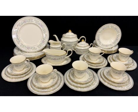 Minton Bordeaux pattern table service for six comprised of; a tea pot, sugar bowls, milk jug, gravy boat and stand, six dinne