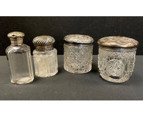 A Victorian cut glass scent bottle, silver floral embossed hinged cover, gilt interior, 8cm high, John Grinsell &amp; Sons, L