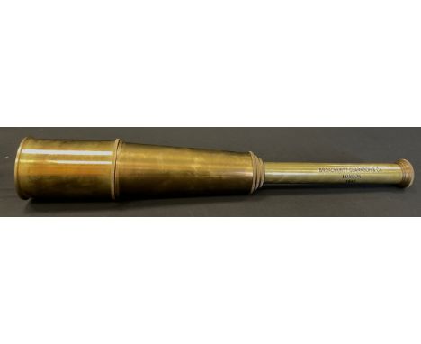 A replica five brass extendable telescope, inscribed ‘Broadhurst Clarkson &amp; Co. London 1942’, 88cm long extended