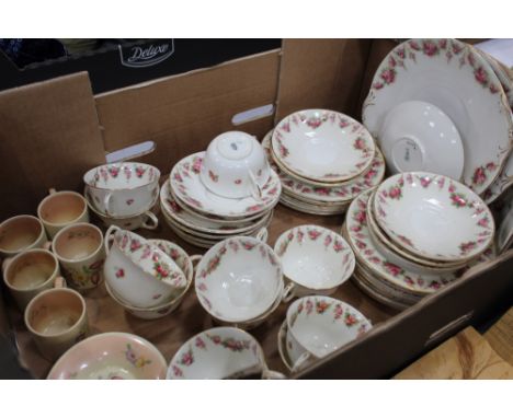 Royal Doulton Rose pattern tea set and five Susie Cooper coffee cans and saucers