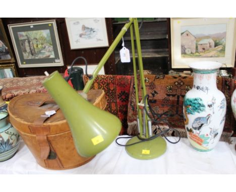 Green Anglepoise style lamp