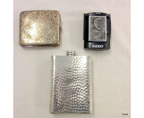 A silver cigarette case, a Zippo lighter and a pewter hip flask