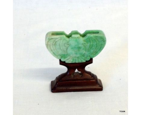 A Jade fan holder carved as a bat the Happiness emblem Chlen Lung 1786-1795