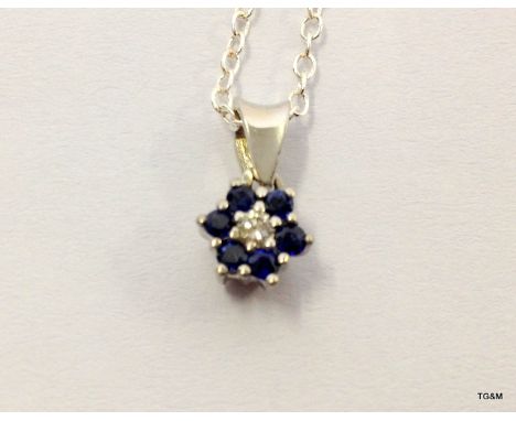 A White gold sapphire and diamond pendant necklace