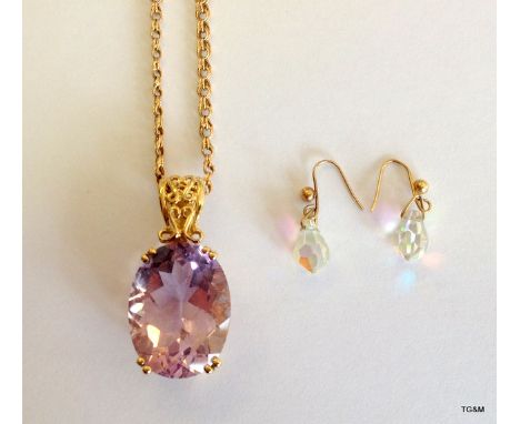 A 9ct gold Amethyst pendant and earrings