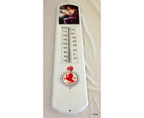 A tin wall mounted thermometer repainted in Lucas King of the Road livery 98cms x 20cms