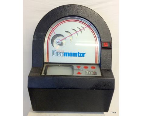 An Arbiter Discmaster wall mounted Dukeboy with 60 CD changer and Manual (The first one ever made for CD's)