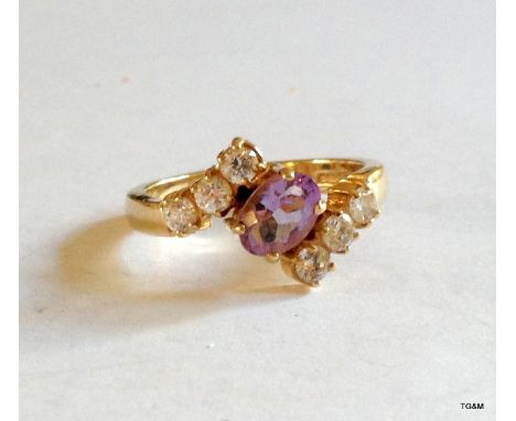 A 9ct gold Amethyst twist ring size N