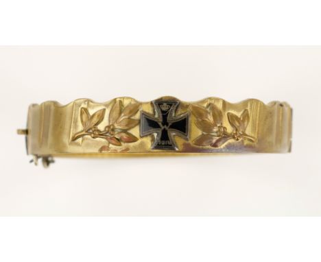 IRON CROSS SOUVENIR BRACELET World War I souvenir bracelet based on a bronze band which once encircled an artillery shell, 2.
