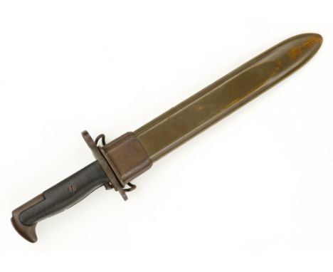 M1 Garand knife bayonet by UC, 10 in. blade, 14.5 in. overall. Green fiberglass scabbard with black plastic handle. Ricasso m