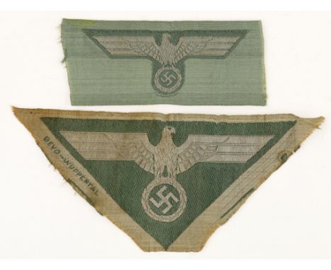 Pair of German army insignia, includes a 4 in. wide BeVo chest eagle and 2.75 in. cap eagle. Both unissued.