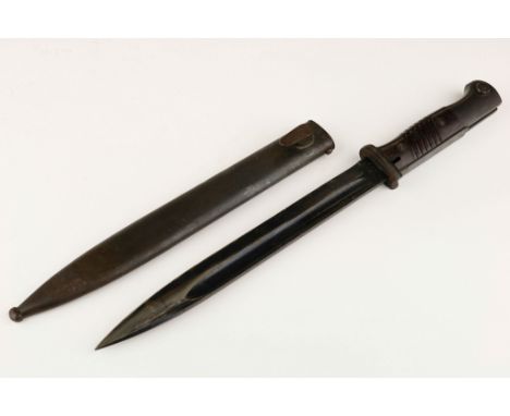 GERMAN K98 BAYONET BY W.K.C. German World War II K98 bayonet by W.K.C., 15 in. long overall with blackened bade showing wear 