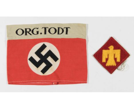 Red cloth armband, 7 x 5.5 in., bearing an embroidered BeVo style ‘ORG. TODT’ band at the top, lightly soiled. The red field 