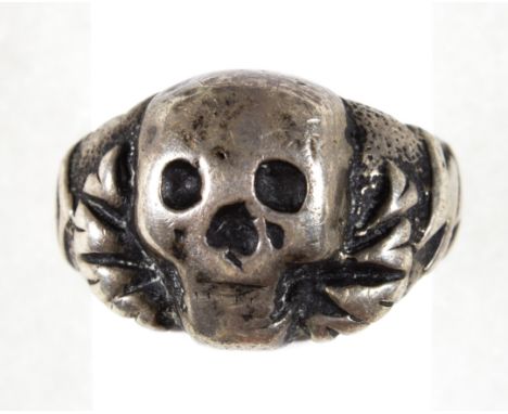 Silver ring bearing the 'Totenkopf' (Death's Head), with 'SS' runes embossed on either side. The interior of the ring is mark