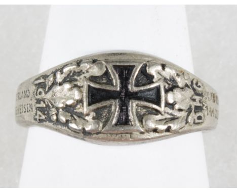 IRON CROSS RING WITH MOTTOES A fine German enameled iron ring, bears a black enameled Iron Cross at the front with oak leaves