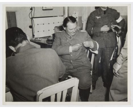 HERMANN GORING SURRENDER PHOTOGRAPHS Lot of three original photographs, each 8 x 10 in. b/w, one a press photo, the others ca