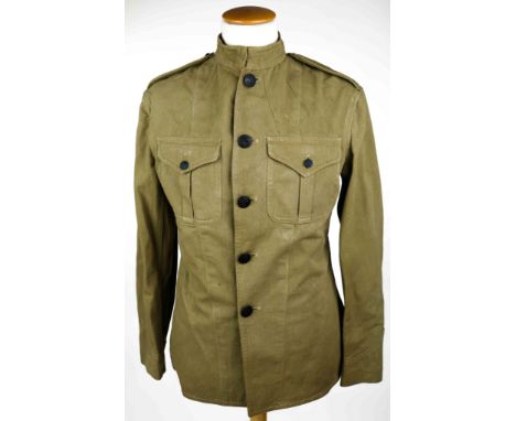 U.S.M.C. FIELD JACKET Rare U.S. Marine Corps field jacket, olive drab cotton twill, five black-painted brass front buttons wi