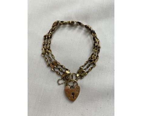 9CT GOLD THREE STRAND GATE BRACELET WITH HEART PADLOCK AND SAFETY CHAIN 8.5G APPROX