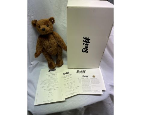 COMMEMORATIVE STEIFF WORLD'S FIRST TEDDY BEAR WITH FIVE PFENIG COIN AROUND ITS NECK, CHESTNUT BROWN