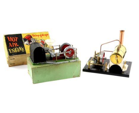 A Davies Charlton stationary hot air engine and a Steamco model live steam stationary engine. (2).    