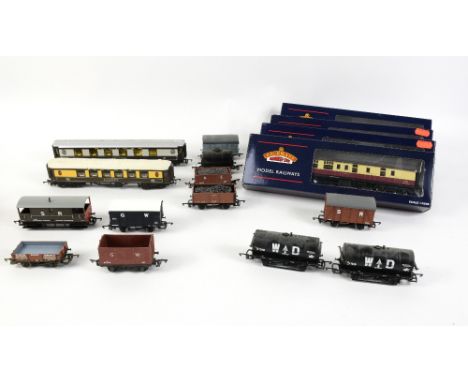 A quantity of assorted coaches, wagons and other rolling stock including boxed Hornby 00-Gauge R6268, 2x R6477, R6321, R296, 