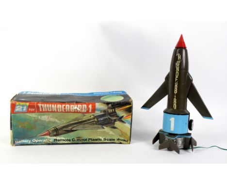 A JR 21 remote controlled Thunderbird 1, boxed, together with an Action Man figure and assorted Doctor Who toys. (8).    