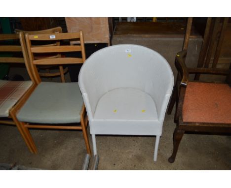 A white painted loom armchair