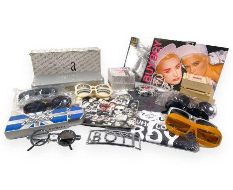 Selection of Boy ephemera: 'Girls Who Love Boys' t-shirt (S), Elton John Aids Foundation Boy watch, 'Buy Boy' and 'Buy More' 