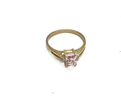A 9ct gold ring set with pink gemstone. Size M and 2.04g Postage A