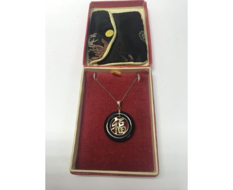 A 9ct gold and jade pendant and chain ,approx 4.84 grams- NO RESERVE