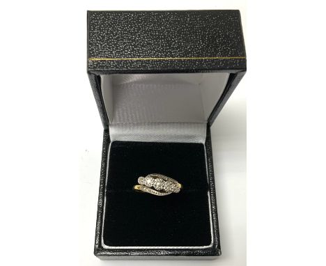 A 1920s 18ct gold and platinum 5 stone diamond ring, Size M (A)