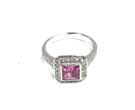 An 18ct white gold ring set with pink Tourmaline and diamond. 5.2g and size M